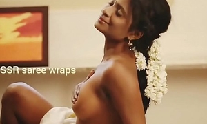 Indian unspecified topless in saree